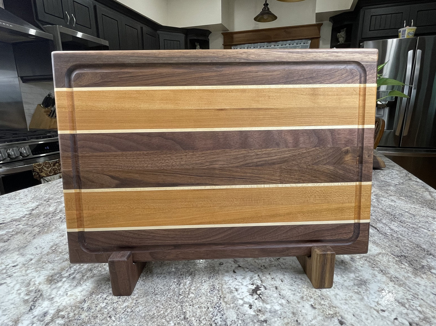 Edge Grain Walnut Cutting Board with two Thick Cherry and Maple Accent stripes