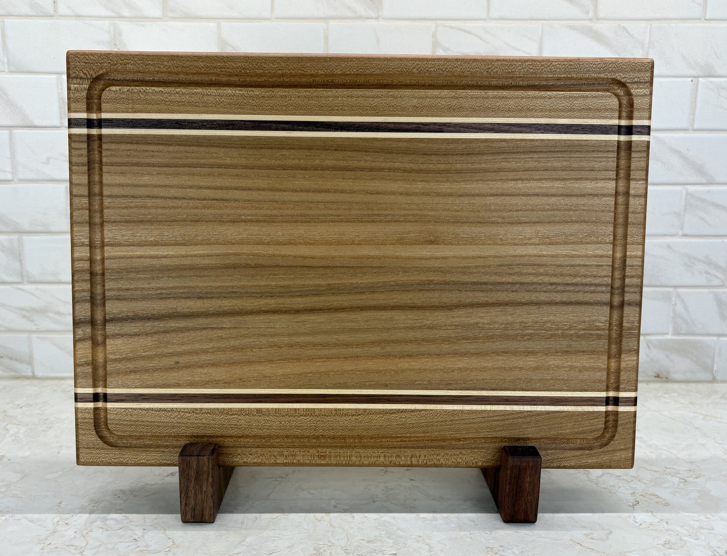 Edge Grain Cutting Board, Made From Red Elm With Two Walnut And Maple Accent Strips